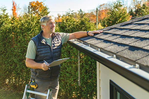Professional Storm Damage Roof Repair technician working in Reddick, FL